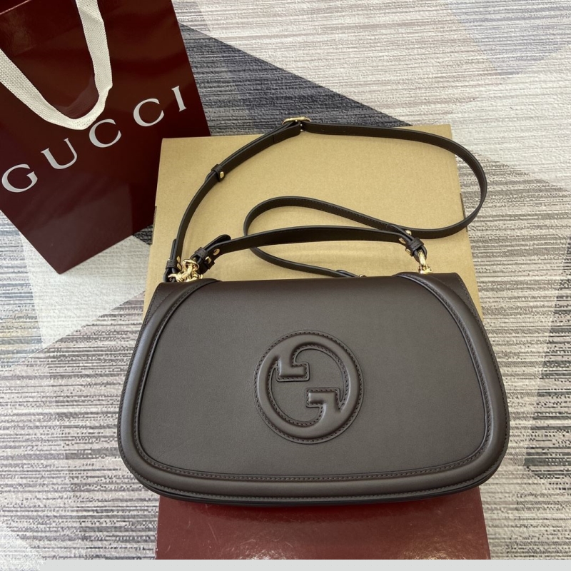 G*u*i top handle bags